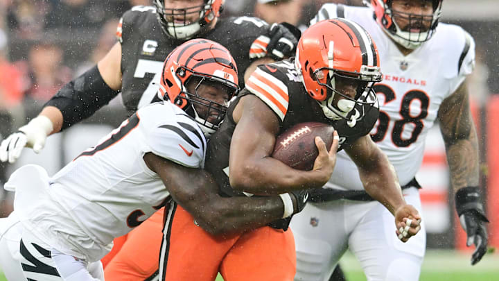 Sep 10, 2023; Cleveland, Ohio, USA; Cincinnati Bengals linebacker Germaine Pratt (57) tackles Cleveland Browns running back Nick Chubb (24) during the first half at Cleveland Browns Stadium. Mandatory Credit: Ken Blaze-Imagn Images