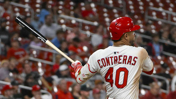 Sep 3, 2025; St. Louis, Missouri, USA;  St. Louis Cardinals first baseman Willson Contreras (40) hits a two run triple against the Athletics during the eighth inning at Busch Stadium. Mandatory Credit: Jeff Curry-Imagn Images