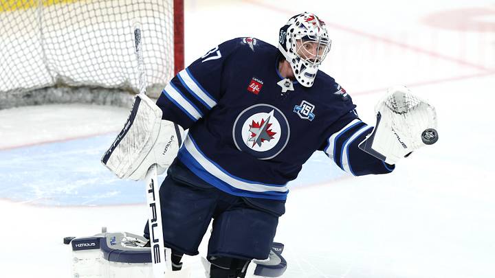 Apr 6, 2026; Winnipeg, Manitoba, CAN; Winnipeg Jets goaltender Connor Hellebuyck (37) warms up before a game against the Seattle Kraken at Canada Life Centre. Mandatory Credit: James Carey Lauder-Imagn Images