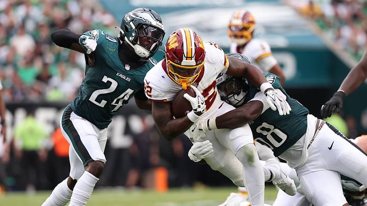 Sep 13, 2026; Philadelphia, Pennsylvania, USA; Washington Commanders running back Jacory Croskey-Merritt (22) runs the ball against Philadelphia Eagles safety Andrew Mukuba (24) during the first half at Lincoln Financial Field. Mandatory Credit: Bill Streicher-Imagn Images Sep 13, 2026; Philadelphia, Pennsylvania, USA; Washington Commanders running back Jacory Croskey-Merritt (22) runs the ball against Philadelphia Eagles safety Andrew Mukuba (24) during the first half at Lincoln Financial Field. Mandatory Credit: Bill Streicher-Imagn Images