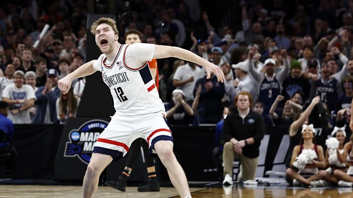 Mar 30, 2024; Boston, MA, USA; Connecticut Huskies guard Cam Spencer (12) reacts against the