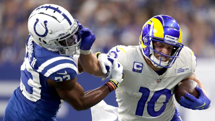 Indianapolis Colts cornerback Kenny Moore II (23) is stiff armed by Los Angeles Rams wide receiver Cooper Kupp (10) as he works to bring him down along the sideline Sunday, Sept. 19, 2021, during a game against the Los Angeles Rams at Lucas Oil Stadium in Indianapolis.