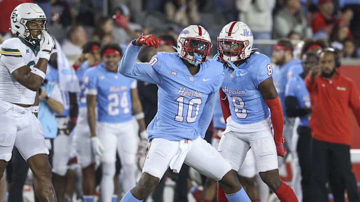 Houston Cougars linebacker Latreveon McCutchin (10) reacts after a defensive play during the fourth quarter against the Baylor Bears at TDECU Stadium. Mandatory Credit: Troy Taormina-Imagn Images Houston Cougars linebacker Latreveon McCutchin (10) reacts after a defensive play during the fourth quarter against the Baylor Bears at TDECU Stadium. Mandatory Credit: Troy Taormina-Imagn Images