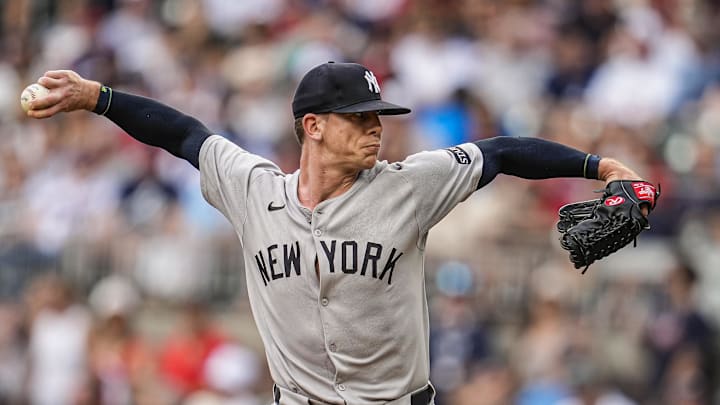 Jul 18, 2025; Cumberland, Georgia, USA; New York Yankees relief pitcher Ian Hamilton (71) pitches against the Atlanta Braves during the first inning at Truist Park. Mandatory Credit: Dale Zanine-Imagn Images