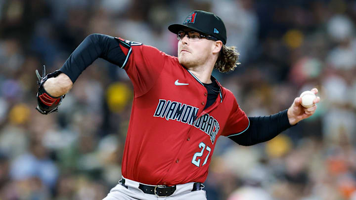 Sep 26, 2025; San Diego, California, USA; Arizona Diamondbacks relief pitcher Andrew Saalfrank (27) throws a pitch during the seventh inning against the San Diego Padres at Petco Park. Mandatory Credit: David Frerker-Imagn Images