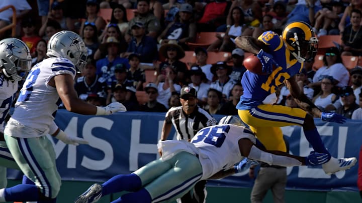 Aug 17, 2019; Honolulu, HI, USA; Los Angeles Rams wide receiver JoJo Natson (19) is tackled by Dallas Cowboys running back Tony Pollard (36) during the first half at Aloha Stadium. Mandatory Credit: Kirby Lee-Imagn Images