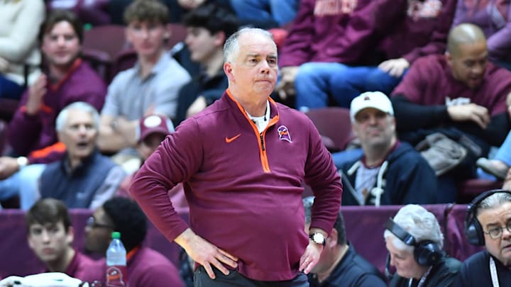Feb 15, 2025; Blacksburg, Virginia, USA;  Virginia Tech Hokies head coach Mike Young watches his team during the second half against the Virginia Cavaliers at Cassell Coliseum. Mandatory Credit: Brian Bishop-Imagn Images