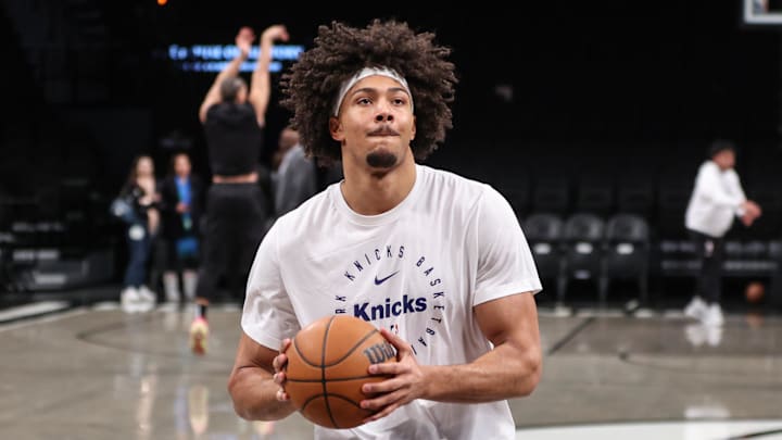 Jan 21, 2025; Brooklyn, New York, USA;  New York Knicks center Jericho Sims (20) warms up prior to the game against the Brooklyn Nets at Barclays Center. Mandatory Credit: Wendell Cruz-Imagn Images
