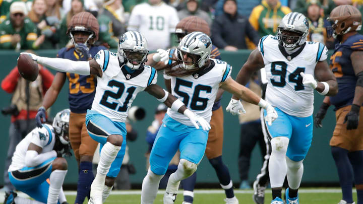 Carolina Panthers safety Nick Scott (21) celebrates recovering a fumble by Green Bay Packers wide receiver Savion Williams (83) during their football game Sunday, November 2, 2025, at Lambeau Field in Green Bay, Wisconsin.