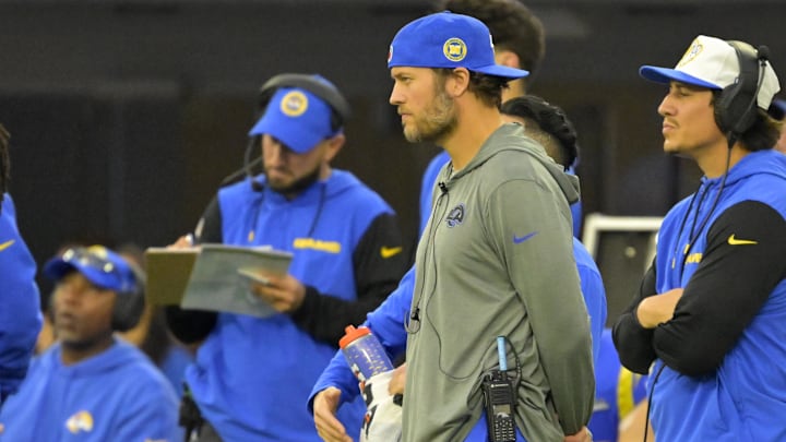 Jan 5, 2025; Inglewood, California, USA; Los Angeles Rams quarterback Matthew Stafford (9) looks on from the sidelines in the second half against the Seattle Seahawks at SoFi Stadium. Mandatory Credit: Jayne Kamin-Oncea-Imagn Images