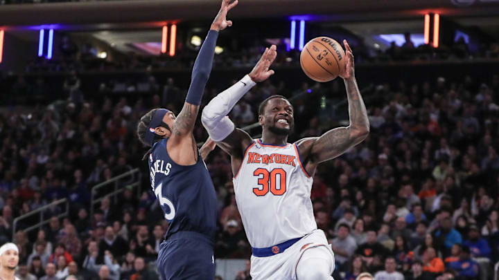 Jan 1, 2024; New York, New York, USA; New York Knicks forward Julius Randle (30) drives past Minnesota Timberwolves forward Jaden McDaniels (3) in the fourth quarter at Madison Square Garden. Mandatory Credit: Wendell Cruz-Imagn Images Jan 1, 2024; New York, New York, USA; New York Knicks forward Julius Randle (30) drives past Minnesota Timberwolves forward Jaden McDaniels (3) in the fourth quarter at Madison Square Garden. Mandatory Credit: Wendell Cruz-Imagn Images