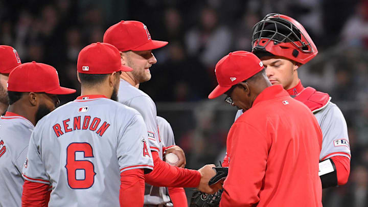 Apr 12, 2024; Boston, Massachusetts, USA; Los Angeles Angels manager Ron Washington (37) relieves starting pitcher Reid Detmers (48) of pitching duties against the Boston Red Sox during the seventh inning at Fenway Park. 