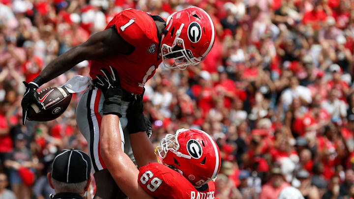 Georgia wide receiver Marcus Rosemy-Jacksaint (1) celebrates with Georgia offensive lineman Tate