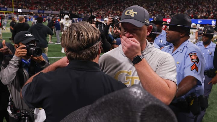 Nov 28, 2025; Atlanta, Georgia, USA; Georgia Bulldogs head coach Kirby Smart talks to Georgia Tech Yellow Jackets head coach Brent Key after a game at Mercedes-Benz Stadium. Mandatory Credit: Brett Davis-Imagn Images