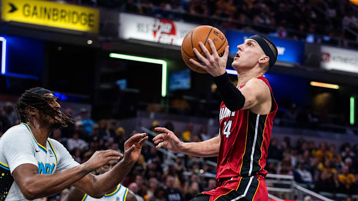 Nov 17, 2024; Indianapolis, Indiana, USA; Miami Heat guard Tyler Herro (14) shoots the ball while Indiana Pacers center Myles Turner (33) defends in the second half at Gainbridge Fieldhouse. Mandatory Credit: Trevor Ruszkowski-Imagn Images Nov 17, 2024; Indianapolis, Indiana, USA; Miami Heat guard Tyler Herro (14) shoots the ball while Indiana Pacers center Myles Turner (33) defends in the second half at Gainbridge Fieldhouse. Mandatory Credit: Trevor Ruszkowski-Imagn Images