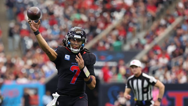 Jan 4, 2026; Houston, Texas, USA;  Houston Texans quarterback C.J. Stroud (7) throws downfield against the Indianapolis Colts during the first half at NRG Stadium. Mandatory Credit: Thomas Shea-Imagn Images