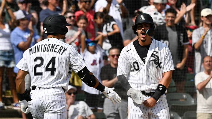 Aug 23, 2026; Chicago, Illinois, USA;  Chicago White Sox third baseman Miguel Vargas (20) celebrates with right fielder Braden Montgomery (24) after he scores against the New York Mets during the eighth inning at Rate Field.  Mandatory Credit: Matt Marton-Imagn Images