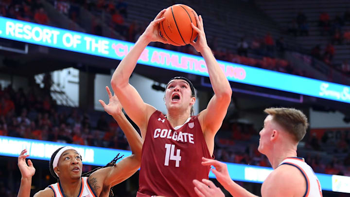 Nov 14, 2023; Syracuse, New York, USA; Colgate Raiders forward Keegan Records (14) drives to the basket against Syracuse. 