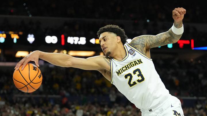 Apr 6, 2026; Indianapolis, IN, USA; Michigan Wolverines forward Yaxel Lendeborg (23) in action against the Connecticut Huskies in the second half during the national championship of the Final Four of the men's 2026 NCAA Tournament at Lucas Oil Stadium. Mandatory Credit: Robert Deutsch-Imagn Images