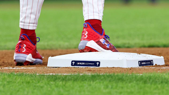 The NLDS logo is seen on first base during the fourth inning in game three of the NLDS for the 2023 MLB playoffs between the Philadelphia Phillies and the Atlanta Braves at Citizens Bank Park. 