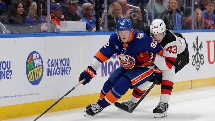 Oct 3, 2026; Elmont, New York, USA; New York Islanders right wing Simon Holmstrom (92) skates with the puck against New Jersey Devils defenseman Luke Hughes (43) during the third period at UBS Arena. Mandatory Credit: Brad Penner-Imagn Images Oct 3, 2026; Elmont, New York, USA; New York Islanders right wing Simon Holmstrom (92) skates with the puck against New Jersey Devils defenseman Luke Hughes (43) during the third period at UBS Arena. Mandatory Credit: Brad Penner-Imagn Images