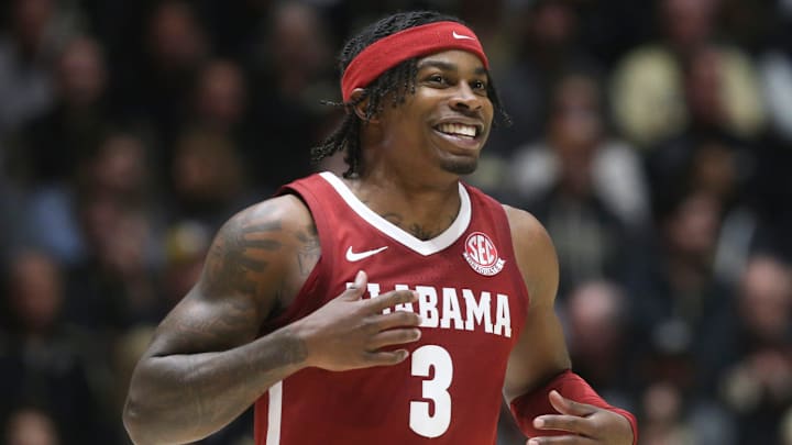 Alabama Crimson Tide guard Latrell Wrightsell Jr. (3) smiles while jogging onto the court Friday, Nov. 15, 2024, during the NCAA men’s basketball game against the Purdue Boilermakers at Mackey Arena in West Lafayette, Ind. Purdue Boilermakers won 87-78.