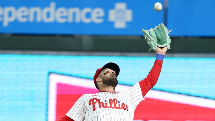 Aug 7, 2026; Philadelphia, Pennsylvania, USA; Philadelphia Phillies first baseman Bryce Harper (3) makes a catch to end the sixth inning against the Toronto Blue Jays at Citizens Bank Park. Mandatory Credit: Bill Streicher-Imagn Images