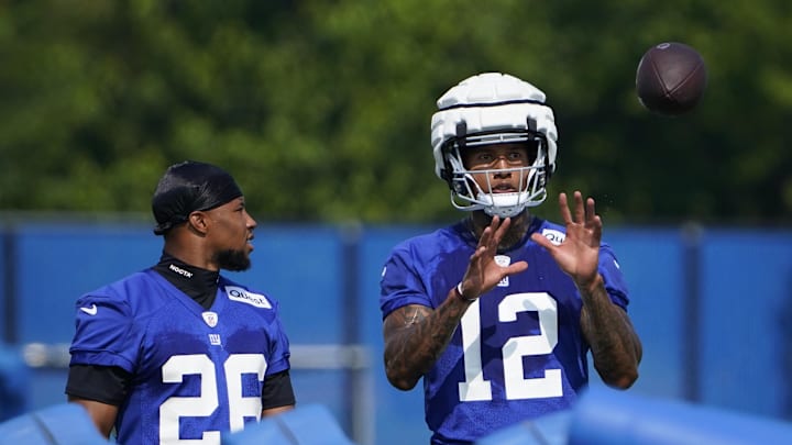 Jul 26, 2023; East Rutherford, NJ, USA; New York Giants running back Saquon Barkley (26) and tight