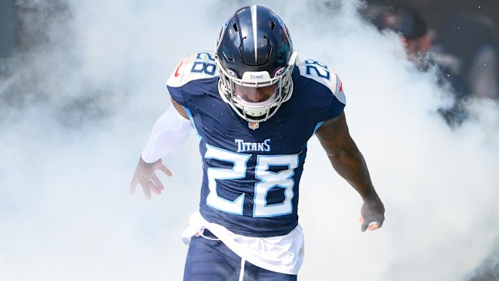 Oct 13, 2024; Nashville, Tennessee, USA;  Tennessee Titans safety Quandre Diggs (28) runs out during player introductions against the Indianapolis Colts at Nissan Stadium. Mandatory Credit: Steve Roberts-Imagn Images