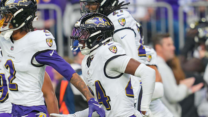 Nov 9, 2025; Minneapolis, Minnesota, USA; Baltimore Ravens cornerback Marlon Humphrey (44) celebrates his interception against Minnesota Vikings quarterback J.J. McCarthy (9) in the second quarter at U.S. Bank Stadium. Mandatory Credit: Brad Rempel-Imagn Images