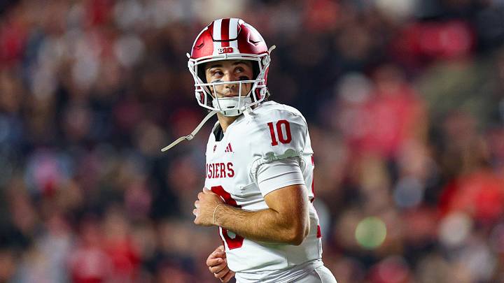 Oct 3, 2026; Piscataway, New Jersey, USA; Indiana Hoosiers quarterback Josh Hoover (10) looks back after throwing a touchdown pass during the first half against the Rutgers Scarlet Knights at SHI Stadium. Mandatory Credit: Vincent Carchietta-Imagn Images Oct 3, 2026; Piscataway, New Jersey, USA; Indiana Hoosiers quarterback Josh Hoover (10) looks back after throwing a touchdown pass during the first half against the Rutgers Scarlet Knights at SHI Stadium. Mandatory Credit: Vincent Carchietta-Imagn Images