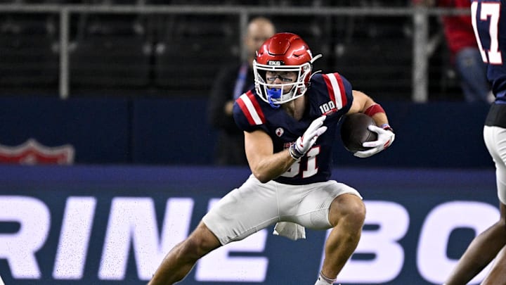 Jan 30, 2025; Arlington, TX, USA; East wide receiver Efton Chism of Eastern Washington (81) runs with the ball during the first half against the West at AT&T Stadium. Mandatory Credit: Jerome Miron-Imagn Images