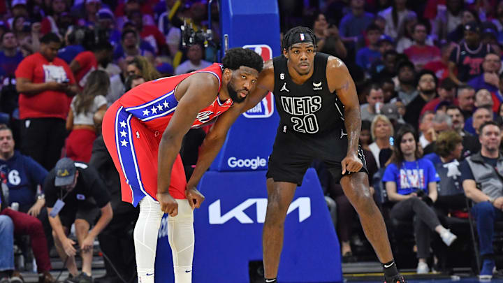 Philadelphia 76ers center Joel Embiid (21) and Brooklyn Nets center Day'Ron Sharpe (20) during game one of the 2023 NBA playoffs at Wells Fargo Center. Philadelphia 76ers center Joel Embiid (21) and Brooklyn Nets center Day'Ron Sharpe (20) during game one of the 2023 NBA playoffs at Wells Fargo Center.