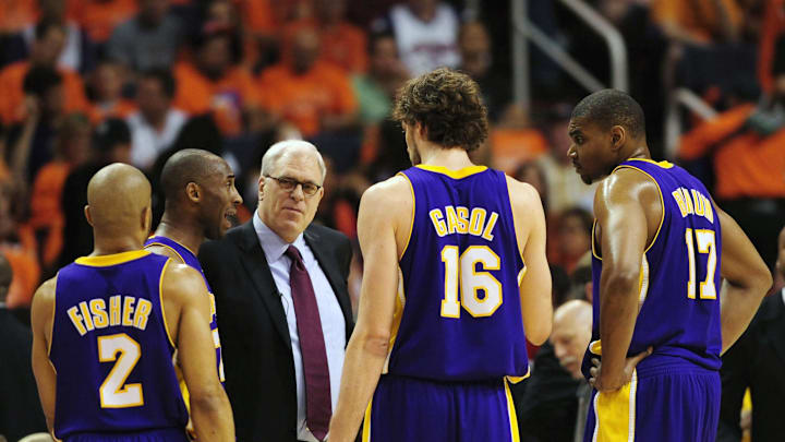 May 29, 2010; Phoenix, AZ, USA; Los Angeles Lakers guard Derek Fisher (2) , guard Kobe Bryant (24) , forward Pau Gasol (16) , center Andrew Bynum (17) talk with head coach Phil Jackson during the second quarter in game six of the western conference finals in the 2010 NBA Playoffs at US Airways Center.  Mandatory Credit: Jennifer Stewart-Imagn Images