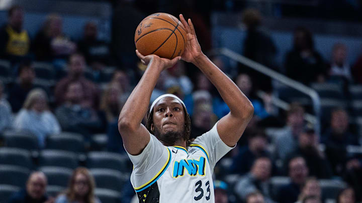 Feb 20, 2025; Indianapolis, Indiana, USA; Indiana Pacers center Myles Turner (33) shoots the ball  in the second half against the Memphis Grizzlies at Gainbridge Fieldhouse. Mandatory Credit: Trevor Ruszkowski-Imagn Images