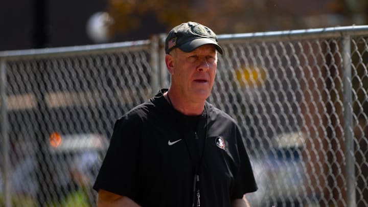 FSU football players walk into the first spring practice of the spring season on Wednesday, March 19, 2025