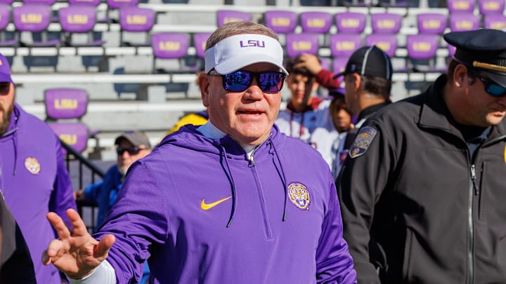 Nov 25, 2023; Baton Rouge, Louisiana, USA;  LSU Tigers head coach Brian Kelly waves to fans during