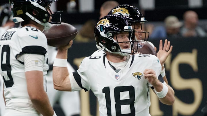 Aug 17, 2025; New Orleans, Louisiana, USA; Jacksonville Jaguars quarterback John Wolford (18) warms up before a game against the New Orleans Saints at Caesars Superdome. Mandatory Credit: Matthew Hinton-Imagn Images