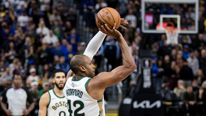 Dec 19, 2023; San Francisco, California, USA; Boston Celtics center Al Horford (42) takes a three-point shot against the Golden State Warriors during the overtime period at Chase Center. Mandatory Credit: John Hefti-Imagn Images