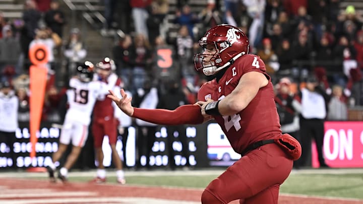 Nov 29, 2025; Pullman, Washington, USA; Washington State Cougars quarterback Zevi Eckhaus (4) makes a bowling motion after a touchdown against the Oregon State Beavers in the second half at Gesa Field at Martin Stadium. Washington State Cougars won 32-8. Mandatory Credit: James Snook-Imagn Images
