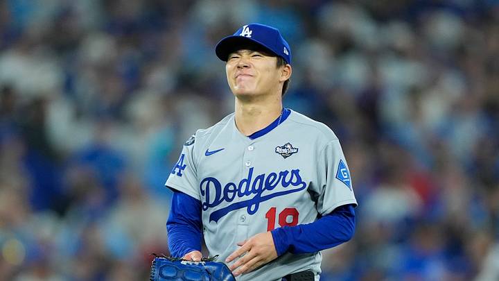 Oct 31, 2025; Toronto, Ontario, CAN; Los Angeles Dodgers pitcher Yoshinobu Yamamoto (18) reacts in the sixth inning against the Toronto Blue Jays during game six of the 2025 MLB World Series at Rogers Centre. Mandatory Credit: John E. Sokolowski-Imagn Images Oct 31, 2025; Toronto, Ontario, CAN; Los Angeles Dodgers pitcher Yoshinobu Yamamoto (18) reacts in the sixth inning against the Toronto Blue Jays during game six of the 2025 MLB World Series at Rogers Centre. Mandatory Credit: John E. Sokolowski-Imagn Images