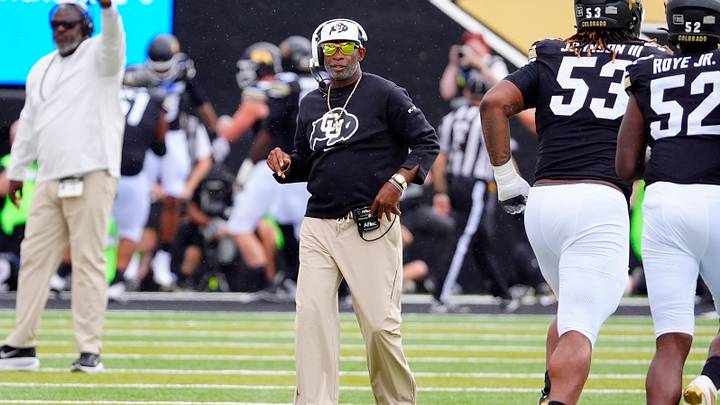 Sep 12, 2026; Boulder, Colorado, USA;  Colorado Buffaloes head coach Deion Sanders reacts to a touchdown in the first quarter against the Weber State Wildcats at Folsom Field.  Mandatory Credit: Ron Chenoy-Imagn Images