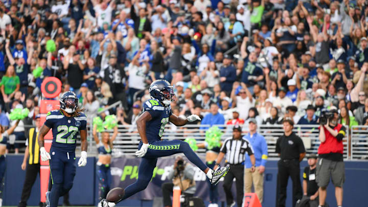 Aug 7, 2025; Seattle, Washington, USA; Seattle Seahawks wide receiver Tory Horton (15) scores a touchdown against the Las Vegas Raiders during the first half at Lumen Field. Aug 7, 2025; Seattle, Washington, USA; Seattle Seahawks wide receiver Tory Horton (15) scores a touchdown against the Las Vegas Raiders during the first half at Lumen Field.