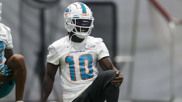 Jun 6, 2023; Miami Gardens, FL, USA; Miami Dolphins wide receiver Tyreek Hill (10) stretches during Jun 6, 2023; Miami Gardens, FL, USA; Miami Dolphins wide receiver Tyreek Hill (10) stretches during