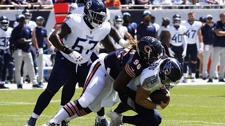 Aug 12, 2023; Chicago, Illinois, USA; Chicago Bears defensive tackle Zacch Pickens (96) sacks Tennessee Titans quarterback Will Levis (8) during the first quarter at Soldier Field. Mandatory Credit: David Banks-Imagn Images