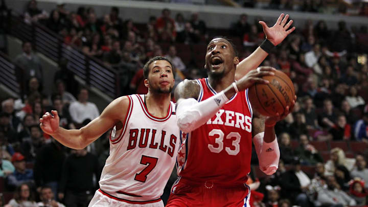 Mar 24, 2017; Chicago, IL, USA; Philadelphia 76ers forward Robert Covington (33) is defended by Chicago Bulls guard Michael Carter-Williams (7) during the second half of the game at United Center. Mandatory Credit: Caylor Arnold-Imagn Images