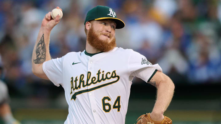 Oakland Athletics pitcher Will Klein (64) throws against the Los Angeles Dodgers during the sixth inning at Oakland-Alameda County Coliseum in 2024.