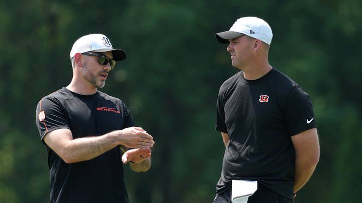 Jun 10, 2025; Cincinnati, OH, USA; Cincinnati Bengals offensive coordinator Dan Pitcher and head coach Zac Taylor talk during practice at Paycor Stadium. Mandatory Credit: Kareem Elgazzar-Imagn Images