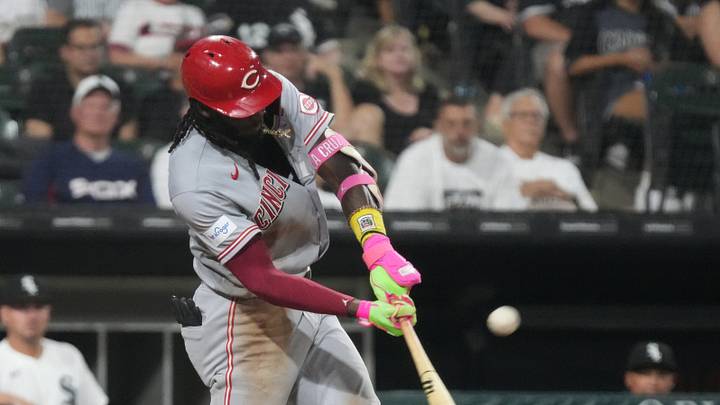Aug 11, 2026; Chicago, Illinois, USA; Cincinnati Reds shortstop Elly de la Cruz (44) hits a one run sacrifice against the Chicago White Sox during the tenth inning at Rate Field. Mandatory Credit: David Banks-Imagn Images