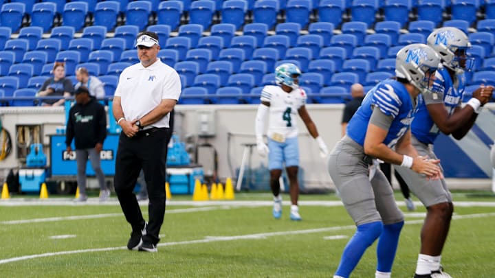 Memphis offensive coordinator Tim Cramsey watches the offense warm up prior to the game between the University of Memphis and Tulane University at Simmons Bank Liberty Stadium in Memphis, Tenn., on Friday, October 13, 2023.